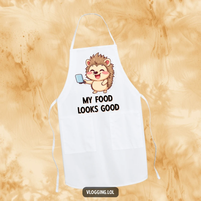 Funny kitchen apron featuring a giggling hedgehog smiling widely while holding a selfie stick, great for a humorous social media chef.