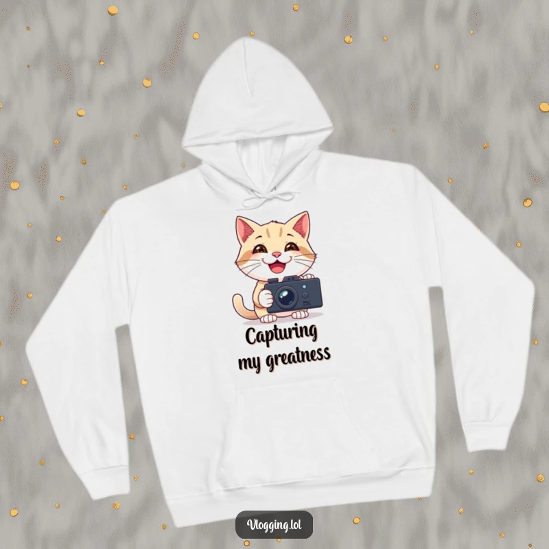 Funny hoodie featuring a smiling cat holding a camera and filming itself, embodying a happy and creative spirit.