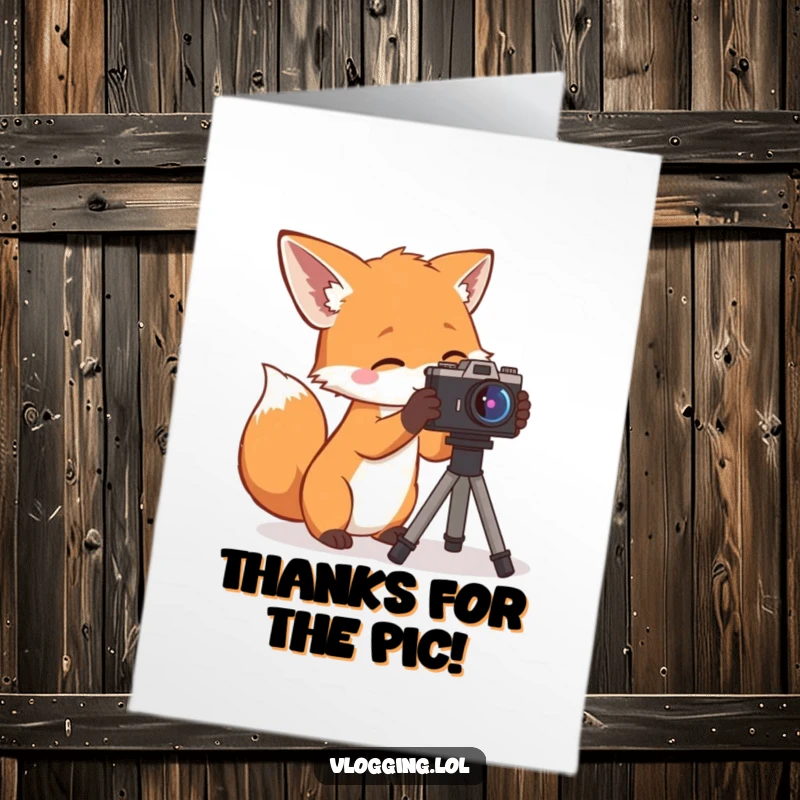 Funny Free Printable Thank You Card: Curious fox carefully adjusting a camera, capturing the moment of your generous deed.