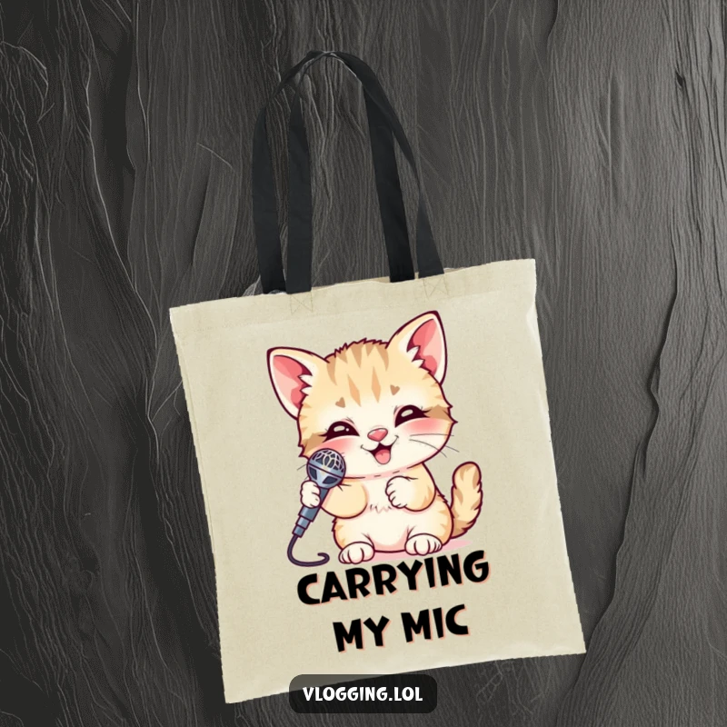 Funny Kitten Tote Bag with a giggling kitten holding a shiny microphone, perfect for carrying music or everyday items. A stylish and humorous bag.